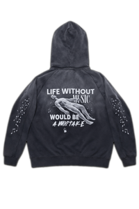 Vintage washed black streetwear hoodie with life without music would be a mistake back graphic and artistic figure print on a clean studio background.
