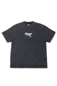 Vintage washed black streetwear t-shirt with minimal chest graphic and subtle logo detail on a clean studio background.