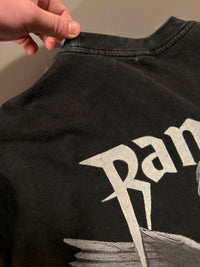 Fallen Angel t-shirt in vintage streetwear style showcasing back print detail and fabric texture in a close-up view.