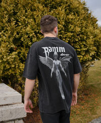 Fallen Angel t-shirt in vintage streetwear style with a large back print, worn outdoors.